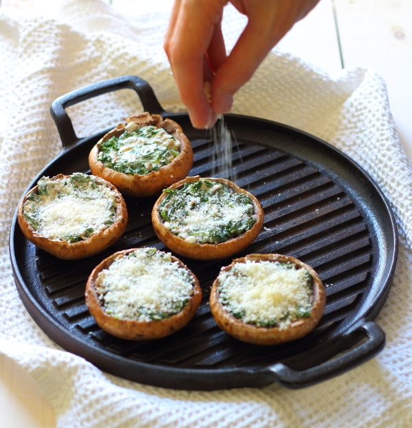 Creamy Spinach Stuffed Mushroom Recipe - Portobello mushrooms stuffed with creamy garlic spinach, then topped with grated parmesan - the perfect summer lunch!