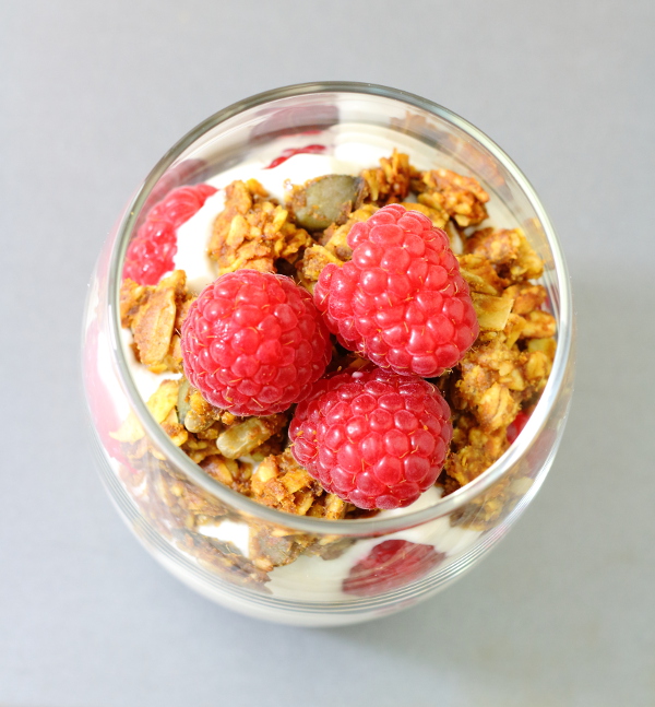 Pumpkin Spice Granola Recipe - Loaded with the flavours of fall and sweetened with honey, these chewy, spicy clusters make a great breakfast parfait. | sliceofkitchenlife.com