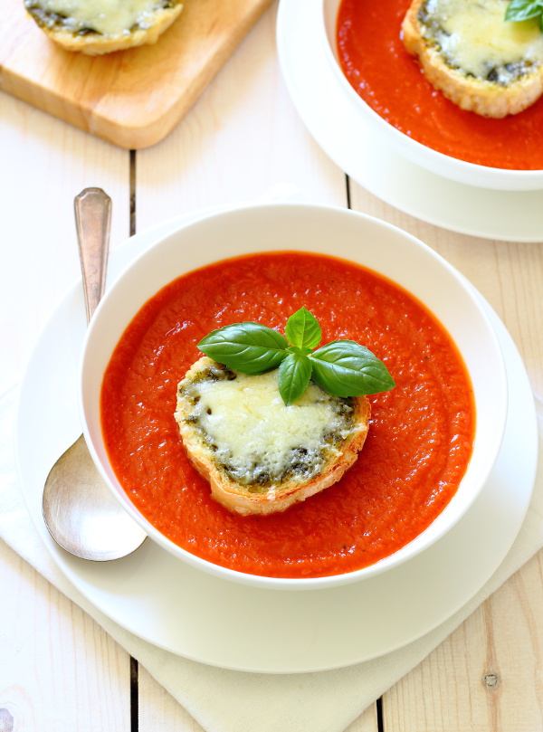 Roasted Red Pepper & Tomato Soup Recipe - Lightly spiced, warming and comforting and served with cheesy pesto toasts for dunking!