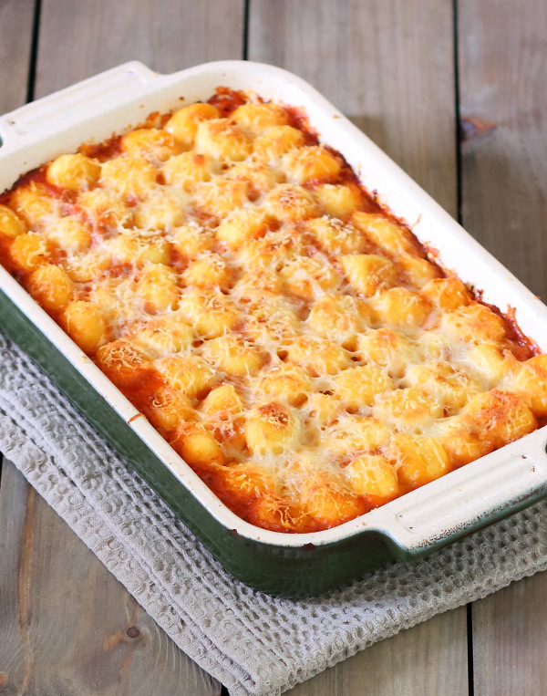 Sausage, Pepper and Gnocchi Casserole (One-Pot) - Sausages and peppers in a rich, creamy tomato and basil sauce, topped with crispy, cheesy gnocchi.