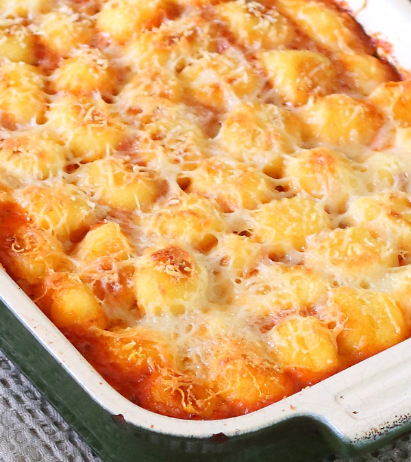 Sausage, Pepper and Gnocchi Casserole (One-Pot) - Sausages and peppers in a rich, creamy tomato and basil sauce, topped with crispy, cheesy gnocchi. | sliceofkitchenlife.com